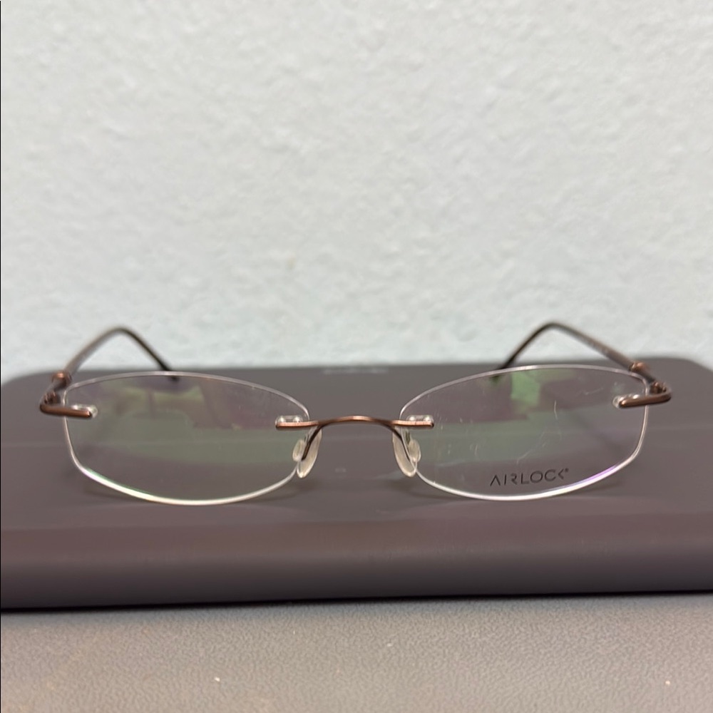Women's Brown Rimless Airlock Divine 202